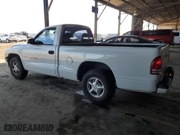1999 Dodge Dakota SLT with VIN 1B7FL26X6XS180827, listed as a Copart auction lot 85789944 with 85,166 mi miles and Salvage Title. Bid and sale history available at carsss.com. Image 2.