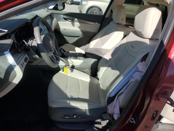 2023 Cadillac XT5 FWD Premium Luxury with VIN 1GYKNCRS8PZ216887, listed as a Copart auction lot 82563534 with 17,275 mi miles and Salvage Title. Bid and sale history available at carsss.com. Image 7.