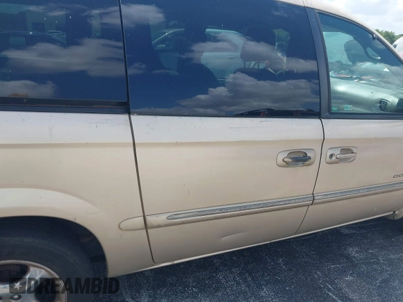 2001 Dodge Caravan ES with VIN 2B8GP54L51R198959, listed as a IAAI auction lot 41941050 with 208,396 mi miles and . Bid and sale history available at carsss.com. Image 12.