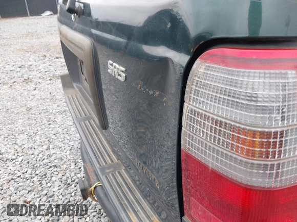 1999 Toyota 4Runner SR5 z VIN JT3HN86R4X0256990, wystawiony jako IAAI lot #41314366 z przebiegiem 362 268 mil mil oraz . Historia ofert i sprzedaży dostępna na DreamBid. Obrazek 13.