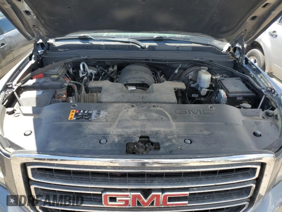 2020 GMC Yukon SLE with VIN 1GKS2AKC5LR120705, listed as a Copart auction lot 72464444 with 69,799 mi miles and Salvage Title. Bid and sale history available at carsss.com. Image 12.