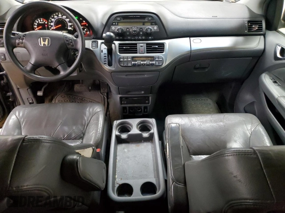 2005 Honda Odyssey EX-L with VIN 5FNRL38785B054186, listed as a Copart auction lot 58072125 with 219,928 mi miles and Salvage title. Bid and sale history available at DreamBid. Image 8.