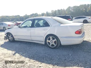 2001 Mercedes-Benz E-Class with VIN WDBJF70J11B285493, listed as a Copart auction lot 77170114 with 226,226 mi miles and Salvage Title. Bid and sale history available at carsss.com. Image 2.