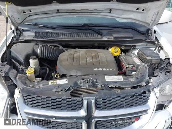 2018 Dodge Grand Caravan SXT with VIN 2C4RDGCG2JR283490, listed as a IAAI auction lot 41796929 with 157,836 mi miles and . Bid and sale history available at DreamBid. Image 10.