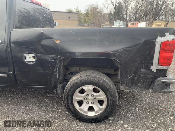 2014 Chevrolet Silverado 1500 LTZ with VIN 1GCVKSEC0EZ265504, listed as a IAAI auction lot 41737186 with 215,850 mi miles and . Bid and sale history available at DreamBid. Image 6.