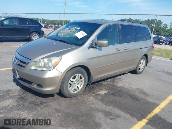2005 Honda Odyssey EX-L z VIN 5FNRL38735B111376, wystawiony jako IAAI lot #42378824 z przebiegiem 191 632 mil mil oraz . Historia ofert i sprzedaży dostępna na DreamBid. Obrazek 2.