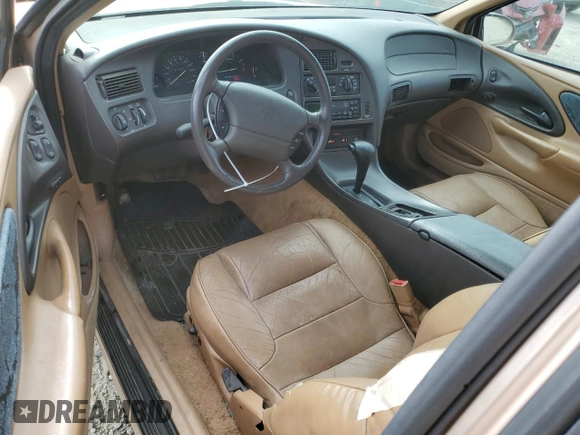 1996 Mercury Cougar z VIN 1MELM62W3TH600523, wystawiony jako Copart lot #78253454 z przebiegiem 84 531 mil mil oraz Tytuł czysty. Historia ofert i sprzedaży dostępna na DreamBid. Obrazek 8.