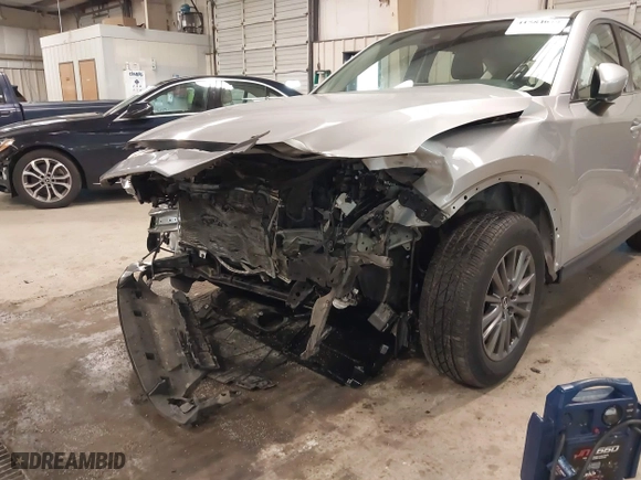 2017 Mazda CX-5 Sport with VIN JM3KFBBL1H0116157, listed as a IAAI auction lot 41584679 with 92,325 mi miles. Bid and sale history available at carsss.com. Image 6.