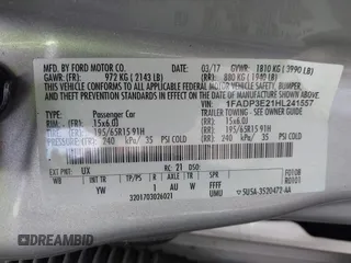 2017 Ford Focus S z VIN 1FADP3E21HL241557, wystawiony jako IAAI lot #42100036 z przebiegiem 106 764 mil mil oraz . Historia ofert i sprzedaży dostępna na DreamBid. Obrazek 9.