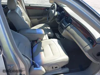 2001 Cadillac DeVille with VIN 1G6KD54Y91U235374, listed as a IAAI auction lot 41874980 with 136,090 mi miles. Bid and sale history available at carsss.com. Image 5.