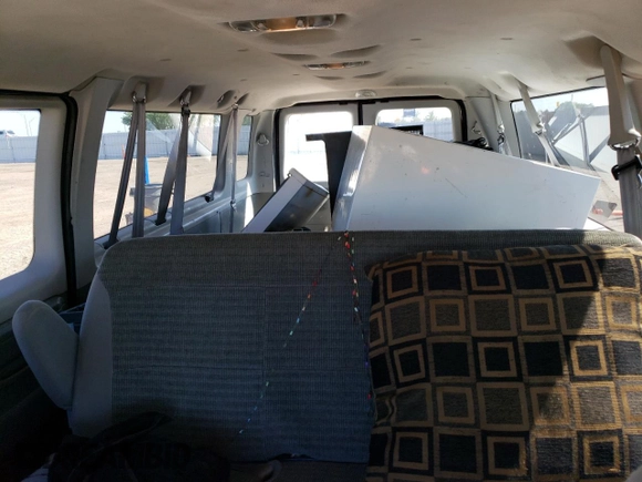 2004 Ford Econoline Passenger XL with VIN 1FBSS31LX4HB16895, listed as a Copart auction lot 65115554 with 48,980 mi miles and Salvage title. Bid and sale history available at DreamBid. Image 10.