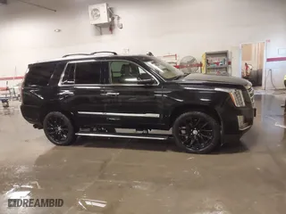 2015 Cadillac Escalade Platinum with VIN 1GYS4PKJ9FR745825, listed as a IAAI auction lot 41201715 with 133,363 mi miles. Bid and sale history available at carsss.com. Image 14.