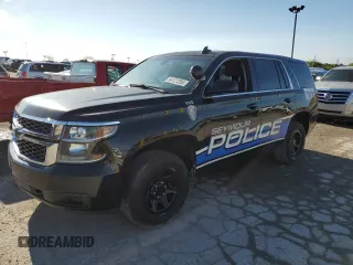 2015 Chevrolet Tahoe Commercial with VIN 1GNLC2ECXFR591789, listed as a Copart auction lot 54121265 with 111,326 mi miles and Salvage title. Bid and sale history available at DreamBid. Image 1.