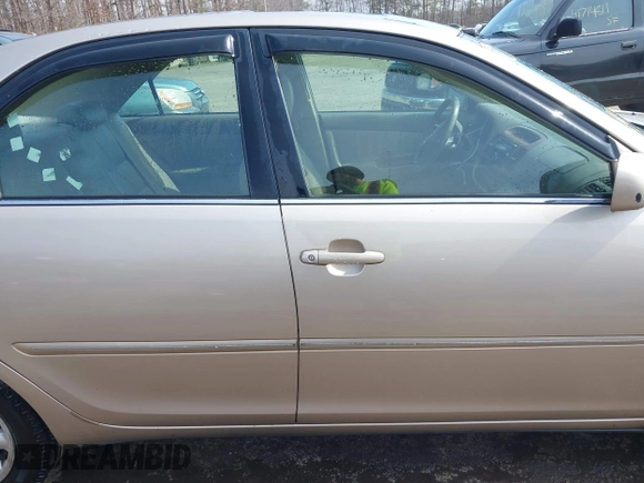 2004 Toyota Camry LE with VIN 4T1BF30K94U587836, listed as a IAAI auction lot 41714277 with 211,893 mi miles and . Bid and sale history available at carsss.com. Image 13.