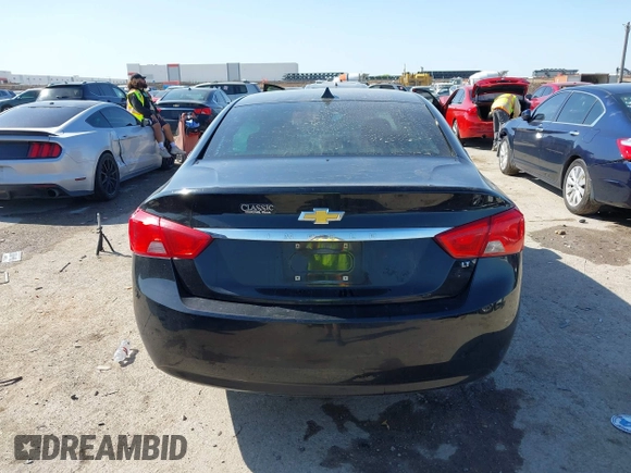 2014 Chevrolet Impala LT with VIN 2G1125S3XE9296363, listed as a IAAI auction lot 41999183 with 206,740 mi miles and . Bid and sale history available at DreamBid. Image 16.