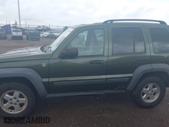 2006 Jeep Liberty Sport with VIN 1J4GL48K76W288408, listed as a IAAI auction lot 39990700 with 215,716 mi miles. Bid and sale history available at carsss.com. Image 14.