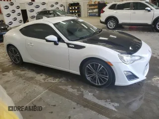 2016 Scion FR-S with VIN JF1ZNAA15G9701621, listed as a Copart auction lot 52331315 with 54,746 mi miles and Clean Title. Bid and sale history available at DreamBid. Image 4.