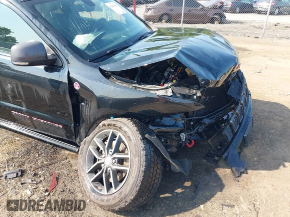 2018 Jeep Grand Cherokee Trailhawk with VIN 1C4RJFLG4JC241057, listed as a IAAI auction lot 42416590 with 81,822 mi miles and . Bid and sale history available at DreamBid. Image 17.
