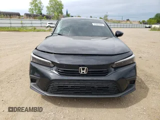 2022 Honda Civic Sport z VIN 2HGFE2F53NH600445, wystawiony jako Copart lot #57883355 z przebiegiem 47 235 mil mil oraz Szkoda całkowita • Salvage title. Historia ofert i sprzedaży dostępna na DreamBid. Obrazek 5.