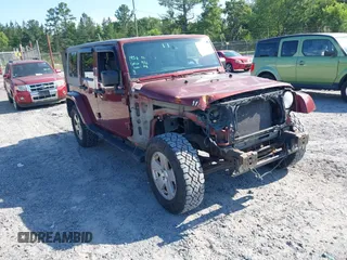 2007 Jeep Wrangler Unlimited Sahara z VIN 1J8GA59187L211825, wystawiony jako IAAI lot #42313099 z przebiegiem 107 554 mil mil oraz . Historia ofert i sprzedaży dostępna na DreamBid. Obrazek 1.