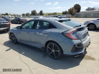 2021 Honda Civic Hatchback Sport with VIN SHHFK7H49MU411682, listed as a Copart auction lot 52366215 with 68,421 mi miles and Salvage Title. Bid and sale history available at carsss.com. Image 2.