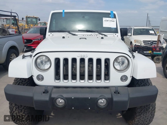 2018 Jeep Wrangler Unlimited Sahara with VIN 1C4HJWEG1JL801934, listed as a IAAI auction lot 42072968 with 112,432 mi miles and . Bid and sale history available at DreamBid. Image 12.