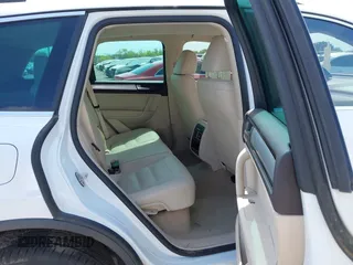 2014 Volkswagen Touareg Sport z VIN WVGEF9BP8ED013755, wystawiony jako IAAI lot #41991936 z przebiegiem 126 912 mil mil oraz . Historia ofert i sprzedaży dostępna na DreamBid. Obrazek 8.