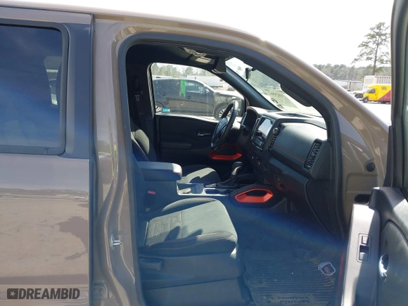 2023 Nissan Frontier PRO-4X with VIN 1N6ED1EKXPN620732, listed as a IAAI auction lot 41839561 with 27,496 mi miles. Bid and sale history available at carsss.com. Image 5.