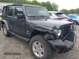 2016 Jeep Wrangler Unlimited Sahara with VIN 1C4HJWEG1GL252860, listed as a IAAI auction lot 42215620 with 85,267 mi miles and . Bid and sale history available at DreamBid. Image 1.