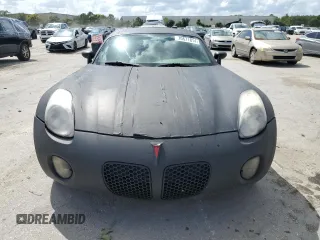 2006 Pontiac Solstice z VIN 1G2MB33BX6Y104410, wystawiony jako Copart lot #70671814 z przebiegiem 123 508 mil mil oraz Czysty tytuł • Clean title. Historia ofert i sprzedaży dostępna na DreamBid. Obrazek 5.