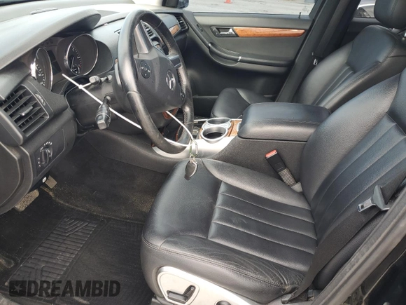 2009 Mercedes-Benz R 3.5L with VIN 4JGCB65E99A095904, listed as a Copart auction lot 54582555 with 212,274 mi miles and Salvage Title. Bid and sale history available at DreamBid. Image 7.