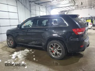 2012 Jeep Grand Cherokee SRT8 with VIN 1C4RJFDJ7CC187475, listed as a Copart auction lot 45191285 with 133,748 mi miles and Salvage Title. Bid and sale history available at carsss.com. Image 2.