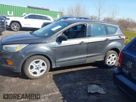 2017 Ford Escape S z VIN 1FMCU0F75HUD15558, wystawiony jako IAAI lot #41890712 z przebiegiem 158 441 mil mil oraz . Historia ofert i sprzedaży dostępna na DreamBid. Obrazek 14.