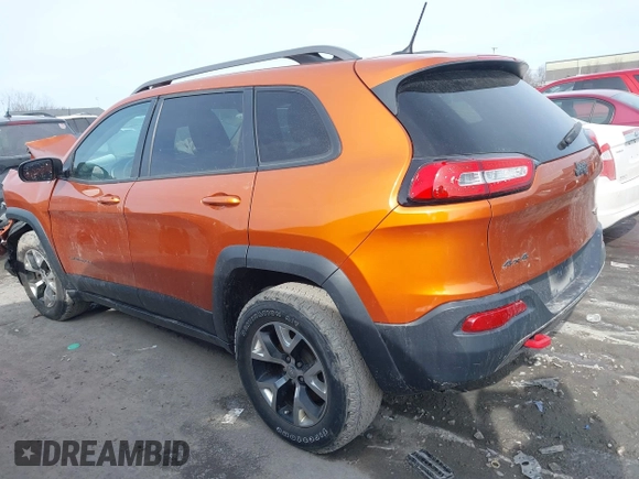 2015 Jeep Cherokee Trailhawk with VIN 1C4PJMBB3FW642266, listed as a IAAI auction lot 41510571 with 72,030 mi miles and . Bid and sale history available at DreamBid. Image 14.