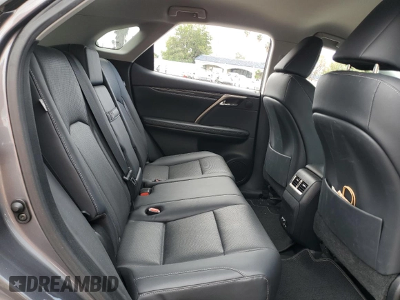 2020 Lexus RX 350 z VIN 2T2AZMAA0LC174391, wystawiony jako Copart lot #49818535 z przebiegiem 126 867 mil mil oraz Szkoda całkowita • Salvage title. Historia ofert i sprzedaży dostępna na DreamBid. Obrazek 11.