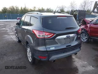 2015 Ford Escape Titanium with VIN 1FMCU0J92FUB74972, listed as a IAAI auction lot 41164519 with 228,785 mi miles and . Bid and sale history available at DreamBid. Image 3.