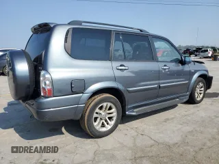 2004 Suzuki XL7 LX z VIN JS3TX92V844109991, wystawiony jako Copart lot #58934415 z przebiegiem 205 951 mil mil oraz Szkoda całkowita • Salvage title. Historia ofert i sprzedaży dostępna na DreamBid. Obrazek 3.