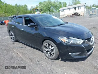 2018 Nissan Maxima SV with VIN 1N4AA6APXJC369633, listed as a IAAI auction lot 42256821 with 67,819 mi miles and . Bid and sale history available at DreamBid. Image 1.