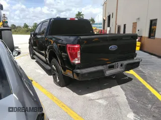 2023 Ford F-150 XL with VIN 1FTEW1C56PFC28013, listed as a IAAI auction lot 42242994 with Not provided miles and . Bid and sale history available at DreamBid. Image 3.