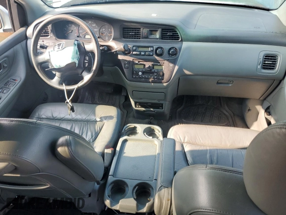2003 Honda Odyssey EX-L с VIN 2HKRL18033H501741, выставлен на аукционе Copart как лот 60496865 с пробегом Не указан миль и Списание • Salvage title. История ставок и продаж доступна на DreamBid. Изображение 8.