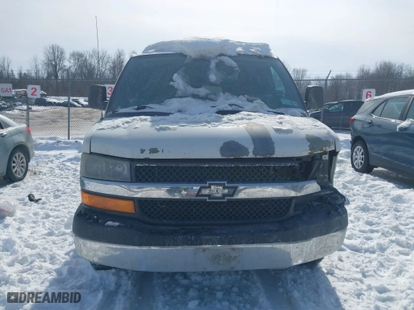 2012 Chevrolet Express Passenger 1LT with VIN 1GAZG1FG0C1150999, listed as a IAAI auction lot 41475070 with 334,911 mi miles. Bid and sale history available at carsss.com. Image 13.