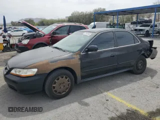 2001 Honda Accord LX with VIN 1HGCG554X1A143892, listed as a Copart auction lot 52162955 with 117,059 mi miles and Salvage title. Bid and sale history available at DreamBid. Image 1.