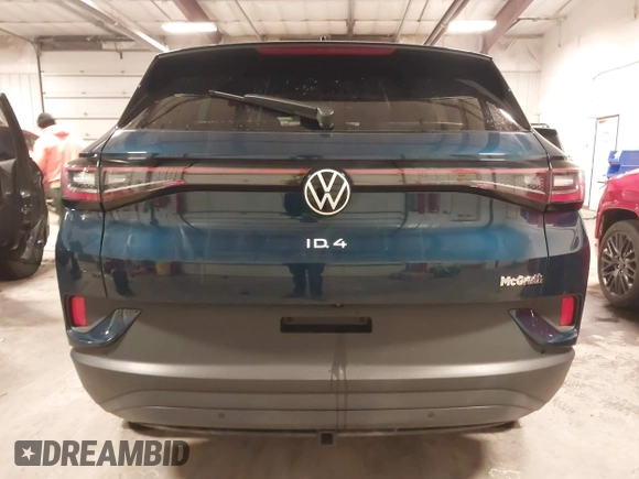 2023 Volkswagen ID.4 Pro z VIN 1V2DNPE84PC038042, wystawiony jako IAAI lot #41446269 z przebiegiem 12 878 mil mil oraz . Historia ofert i sprzedaży dostępna na DreamBid. Obrazek 17.