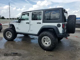 2018 Jeep Wrangler JK Unlimited Rubicon Recon with VIN 1C4BJWFG8JL816211, listed as a Copart auction lot 71461564 with 41,576 mi miles and Salvage Title. Bid and sale history available at carsss.com. Image 2.