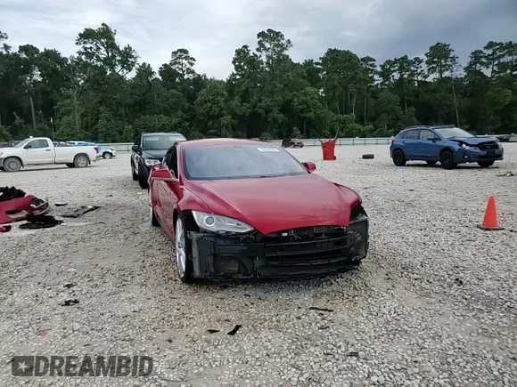 2014 Tesla Model S 60 with VIN 5YJSA1H11EFP43669, listed as a Copart auction lot 62368605 with Not provided miles and Salvage title. Bid and sale history available at DreamBid. Image 14.