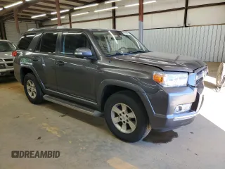 2011 Toyota 4Runner Trail z VIN JTEBU5JR6B5039779, wystawiony jako Copart lot #57750965 z przebiegiem 199 116 mil mil oraz Szkoda całkowita • Salvage title. Historia ofert i sprzedaży dostępna na DreamBid. Obrazek 4.