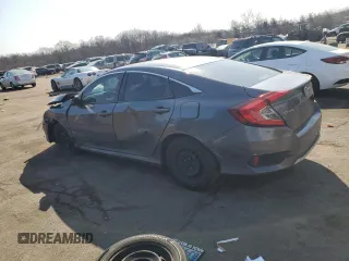 2019 Honda Civic LX with VIN 2HGFC2F66KH541403, listed as a Copart auction lot 48694535 with 118,906 mi miles and Salvage Title. Bid and sale history available at DreamBid. Image 2.