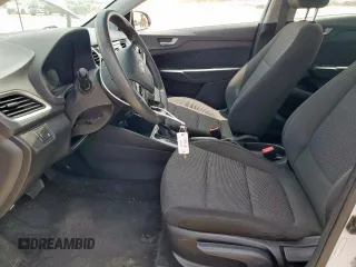 2021 Hyundai Accent SE z VIN 3KPC24A62ME132613, wystawiony jako Copart lot #57827625 z przebiegiem 81 404 mil mil oraz Szkoda całkowita • Salvage title. Historia ofert i sprzedaży dostępna na DreamBid. Obrazek 7.
