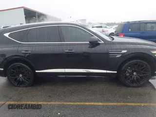 2022 Genesis GV80 with VIN KMUHCESC0NU083778, listed as a IAAI auction lot 41553215 with 93,384 mi miles and . Bid and sale history available at DreamBid. Image 13.