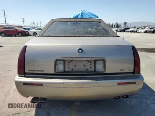 2002 Cadillac Eldorado Touring ETC z VIN 1G6ET12952B101866, wystawiony jako Copart lot #57365965 z przebiegiem Nie podano mil oraz Tytuł czysty. Historia ofert i sprzedaży dostępna na DreamBid. Obrazek 6.